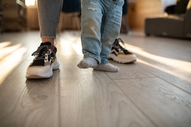 Why does my hardwood floor creak when I walk?